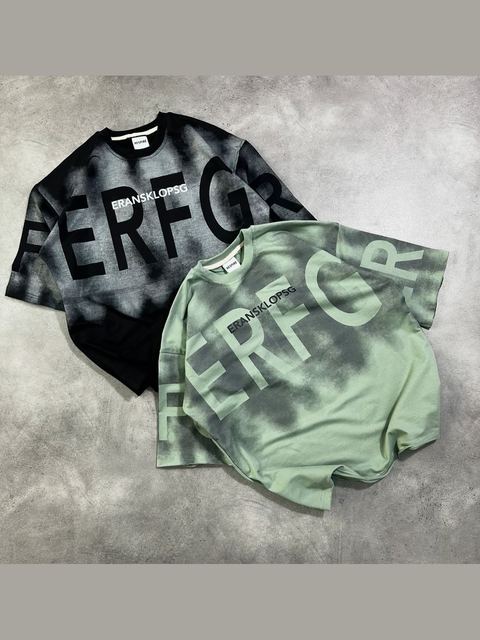 Item No. 24 — Two tie-dye tees, black and green