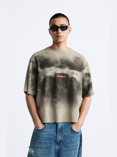 Item No. 27 — Model wearing a grey tie-dye tee